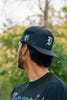 "V" LOGO EMBROIDERED SNAPBACK HAT